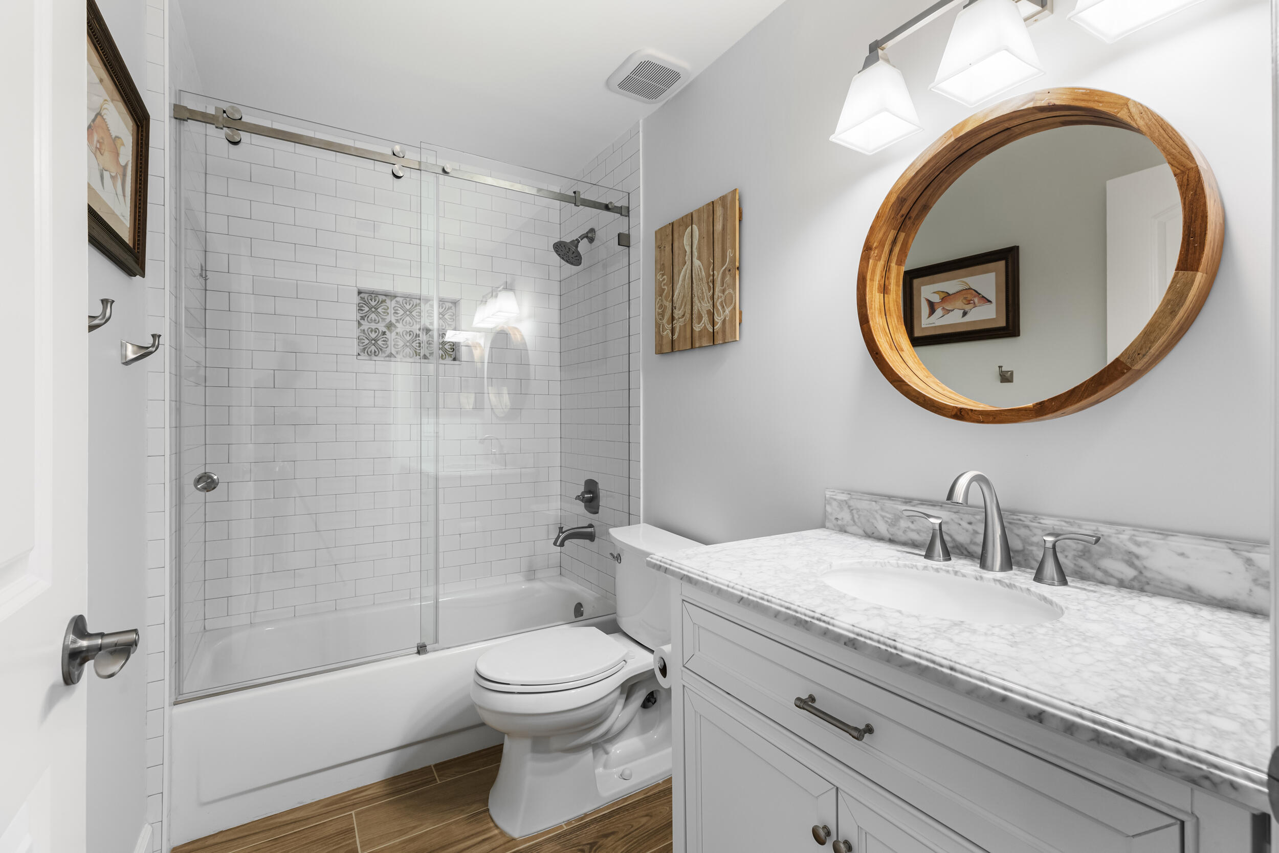 14451 Parker Ridge Court Delray Beach, FL 33484 - Photo 33 of 48 a bathroom with a granite countertop toilet sink and mirror