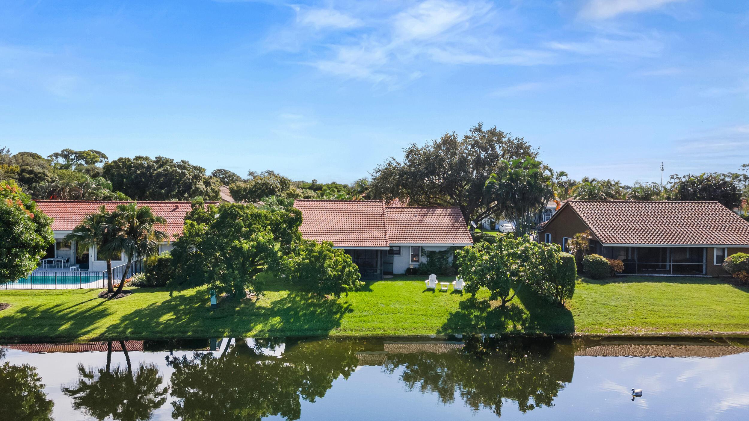 14451 Parker Ridge Court Delray Beach, FL 33484 - Photo 38 of 48 a view of house with garden space and sitting space