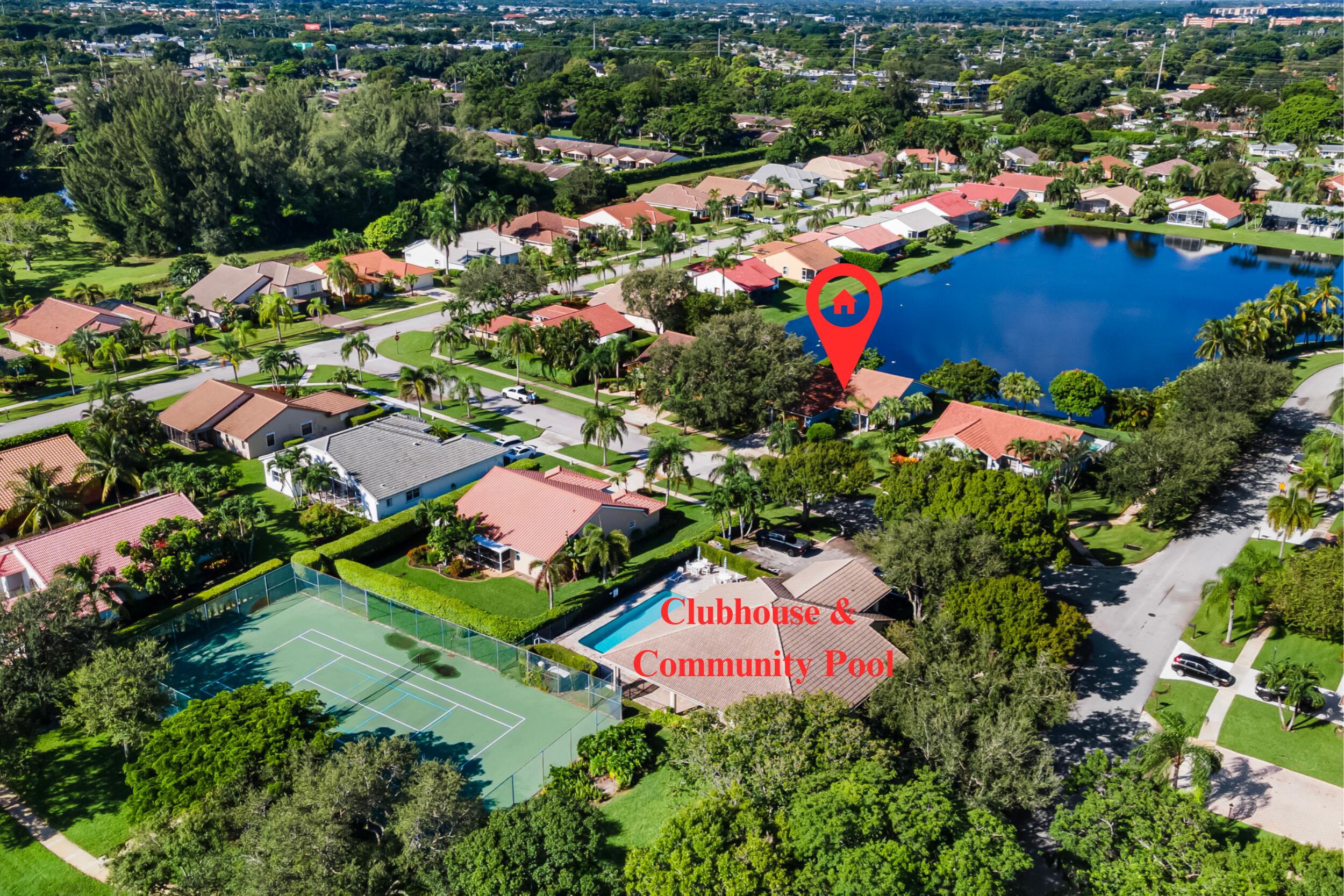14451 Parker Ridge Court Delray Beach, FL 33484 - Photo 40 of 48 an aerial view of residential houses with outdoor space and swimming pool