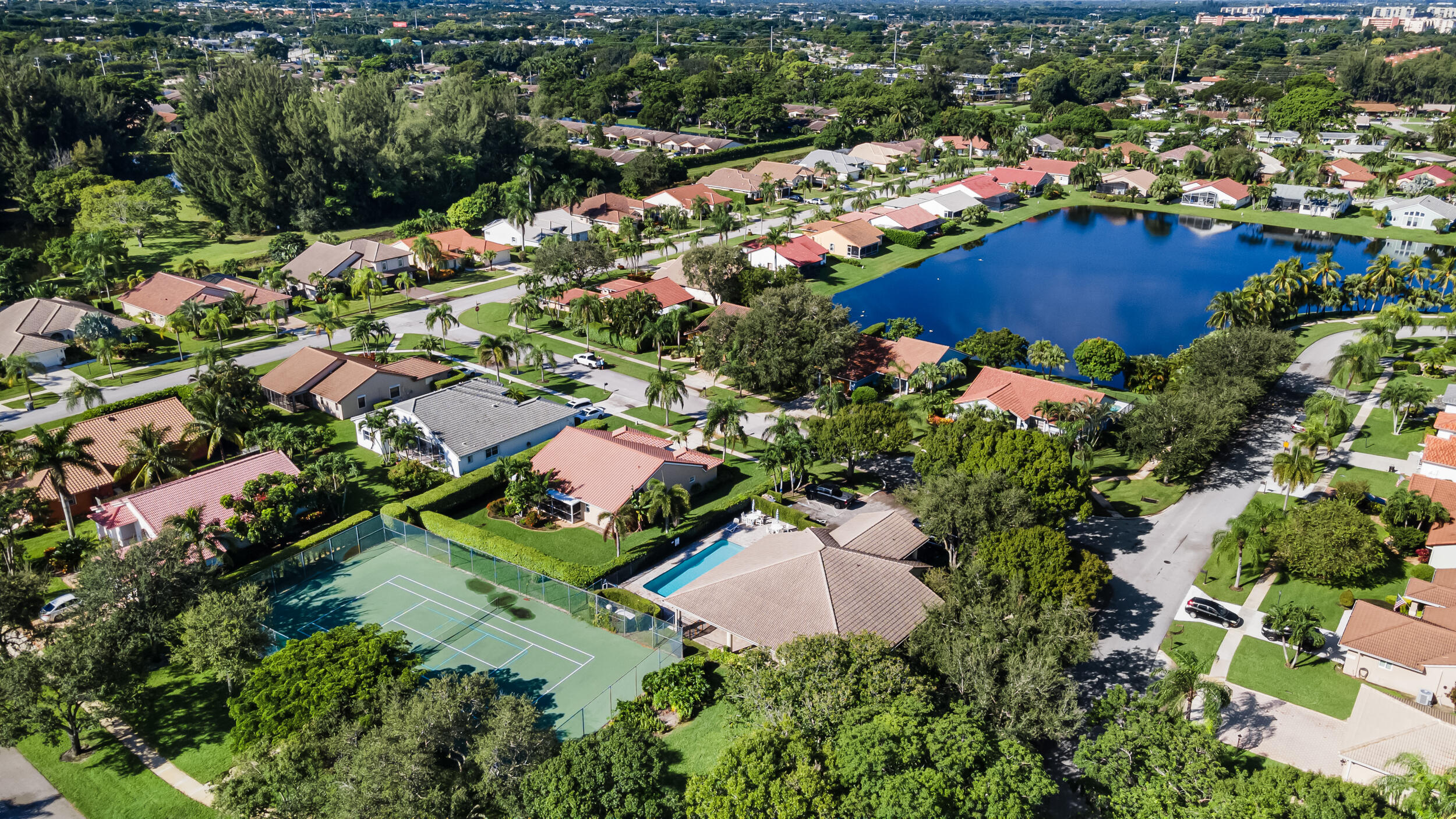 14451 Parker Ridge Court Delray Beach, FL 33484 - Photo 41 of 48 an aerial view of residential houses with outdoor space and swimming pool