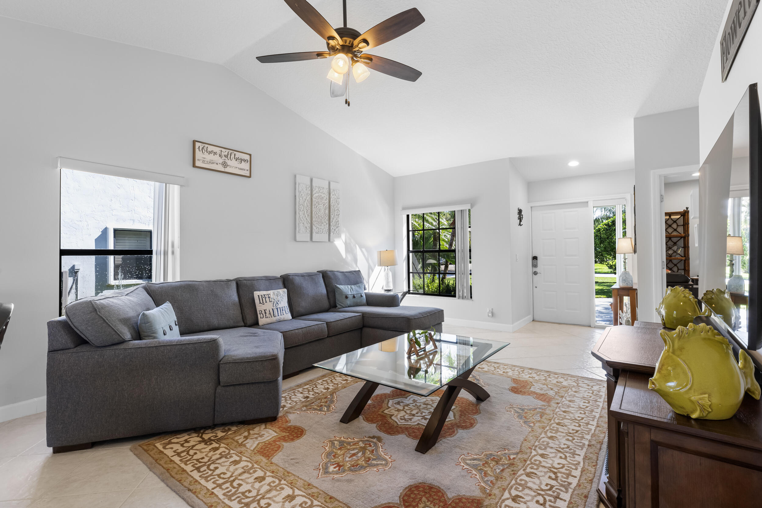 14451 Parker Ridge Court Delray Beach, FL 33484 - Photo 8 of 48 a living room with furniture and a window