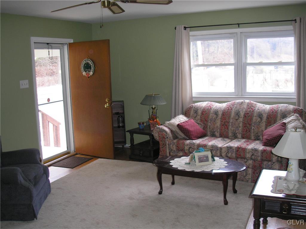 5785 Haasadahl Road Orefield, PA 18069 - Photo 16 of 28 a living room with furniture and a window