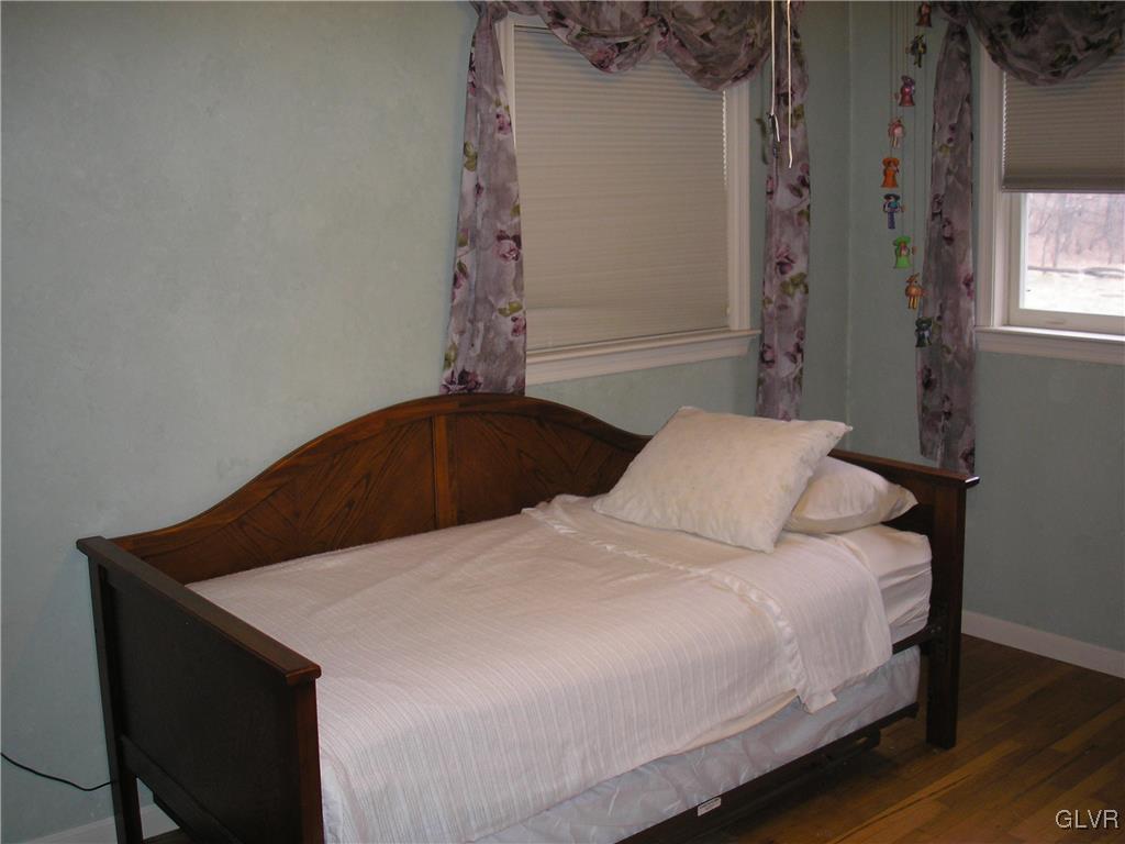 5785 Haasadahl Road Orefield, PA 18069 - Photo 19 of 28 a bedroom with a bed and a window