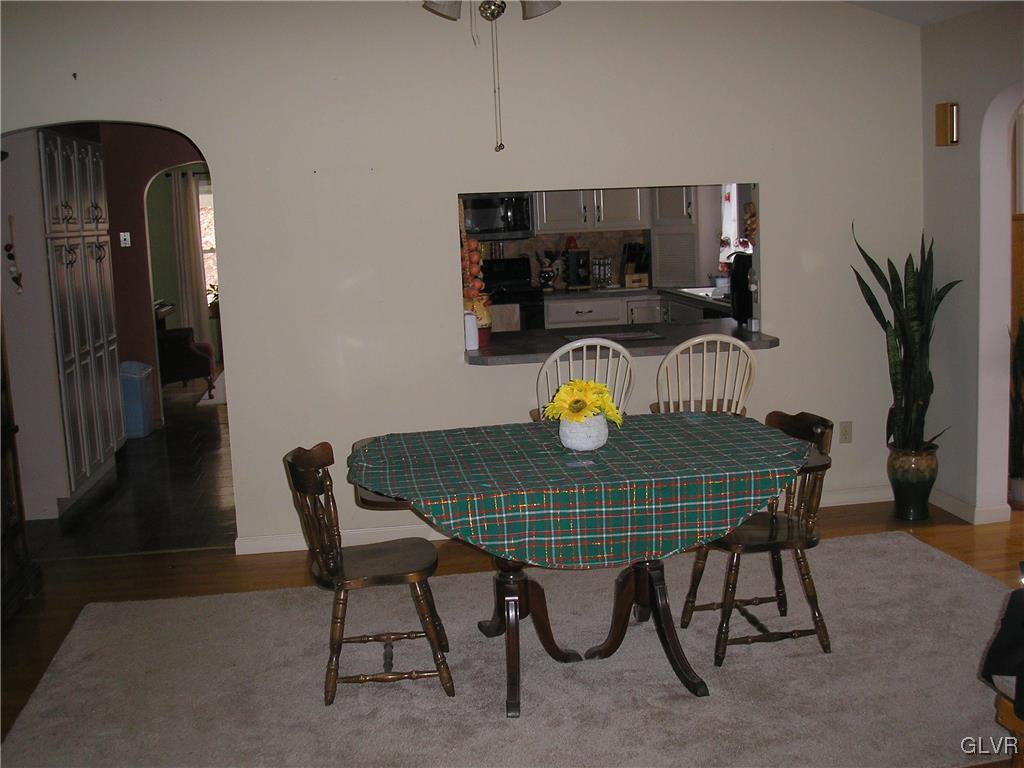 5785 Haasadahl Road Orefield, PA 18069 - Photo 7 of 28 a view of a dining room and hall with furniture