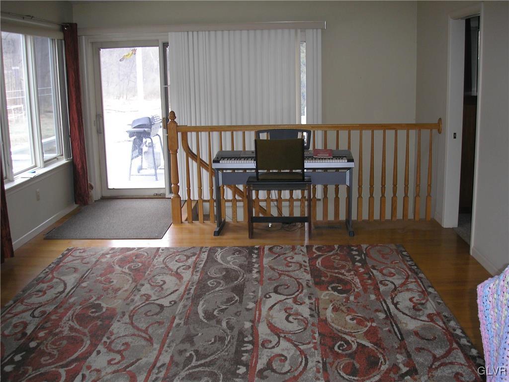 5785 Haasadahl Road Orefield, PA 18069 - Photo 8 of 28 a view of a workspace with furniture and a window