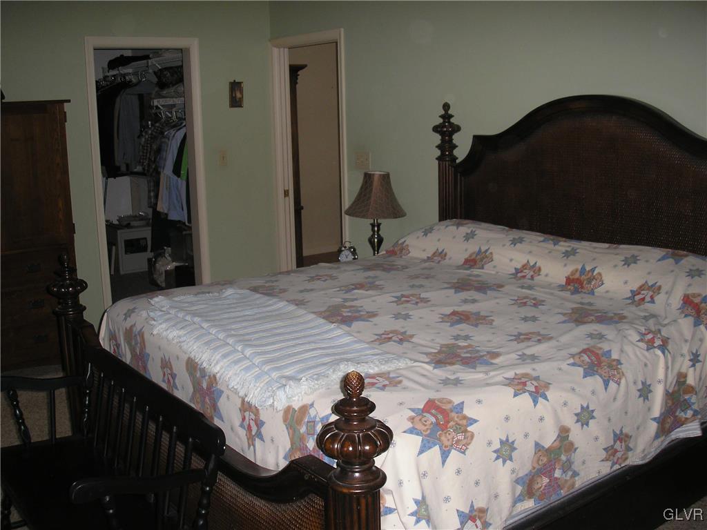 5785 Haasadahl Road Orefield, PA 18069 - Photo 10 of 28 a bed sitting in a bedroom and dresser