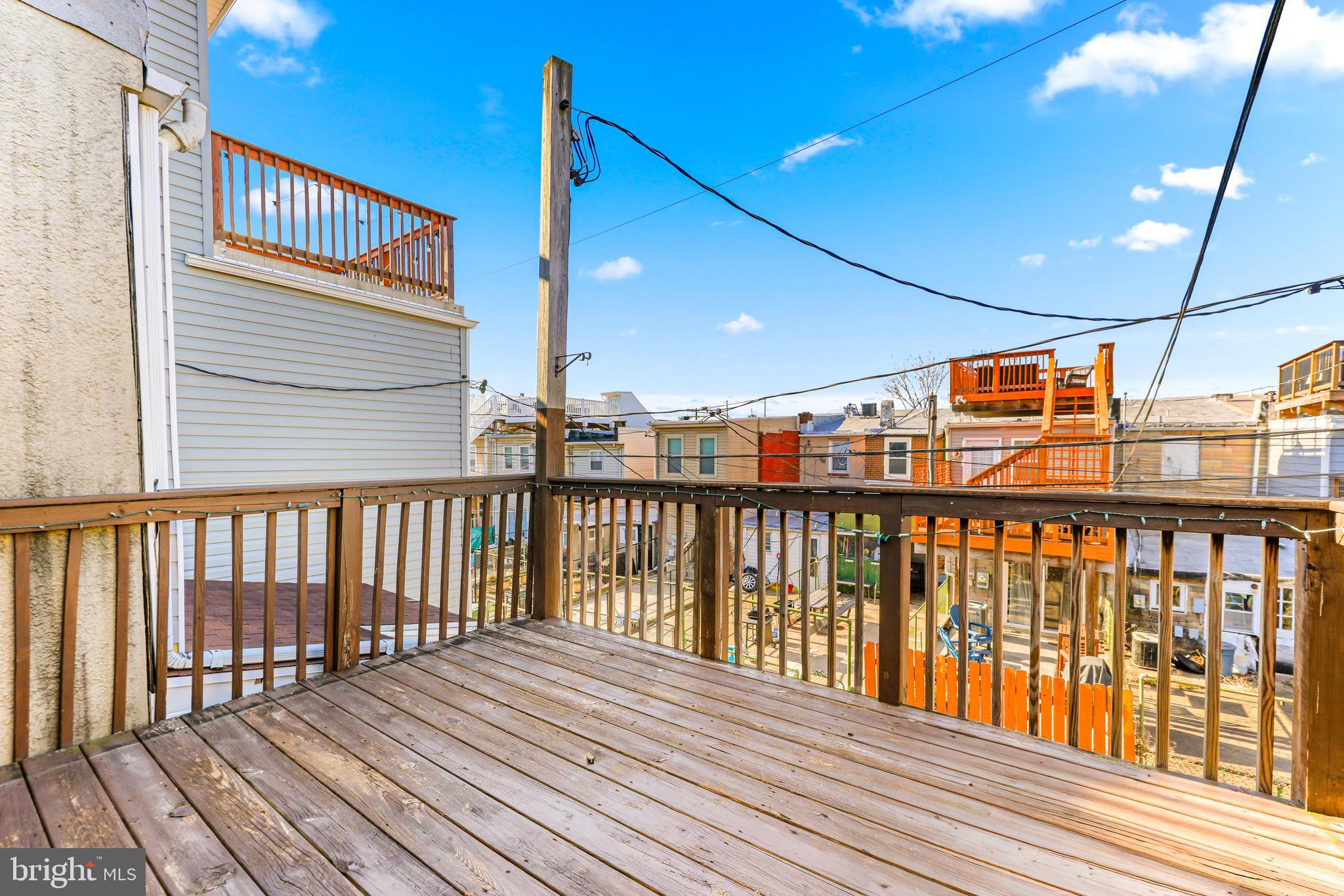 1432 Haubert Street Baltimore, MD 21230 - Photo 17 of 28 a view of balcony with wooden floor