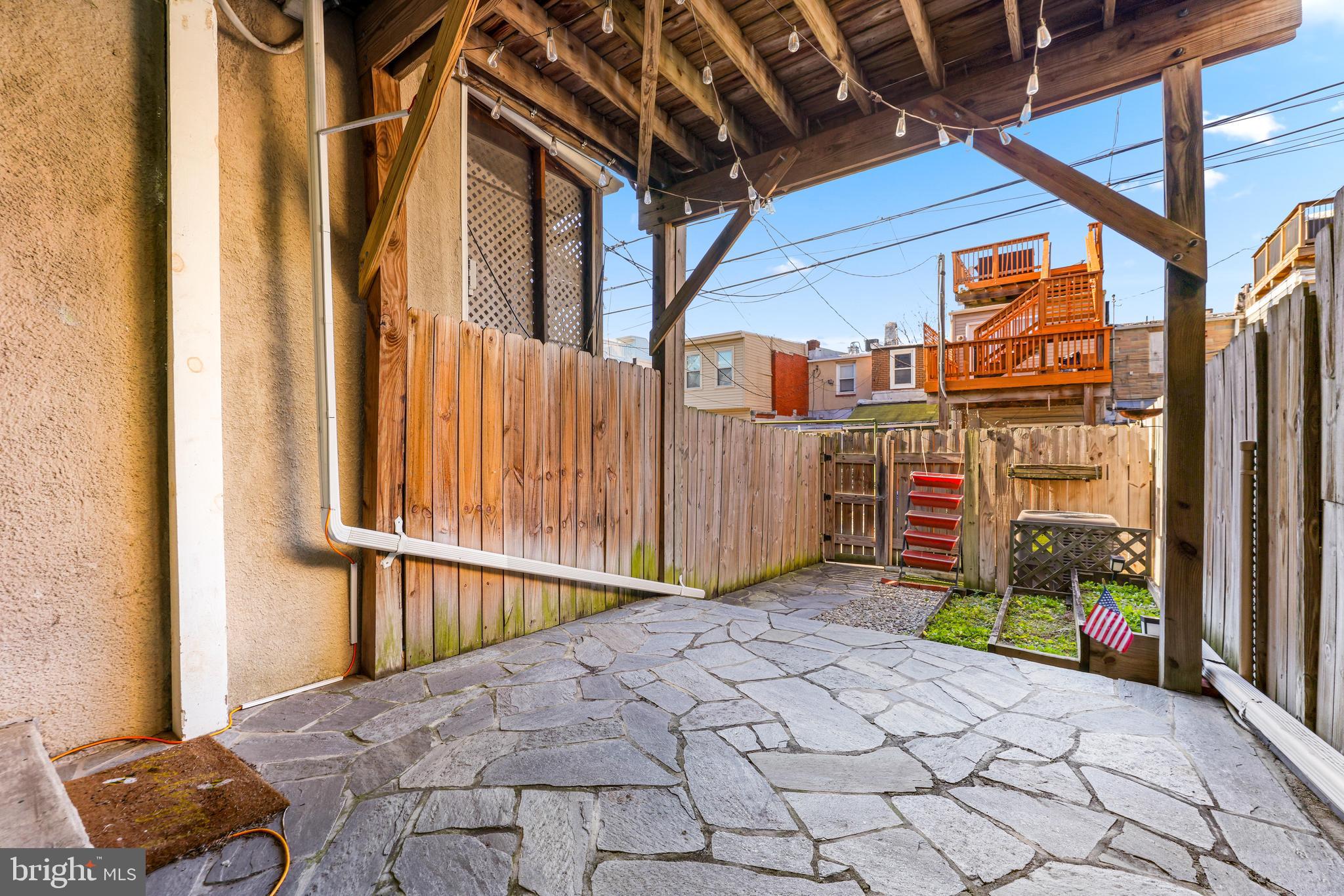 1432 Haubert Street Baltimore, MD 21230 - Photo 18 of 28 a view of a pathway along a building