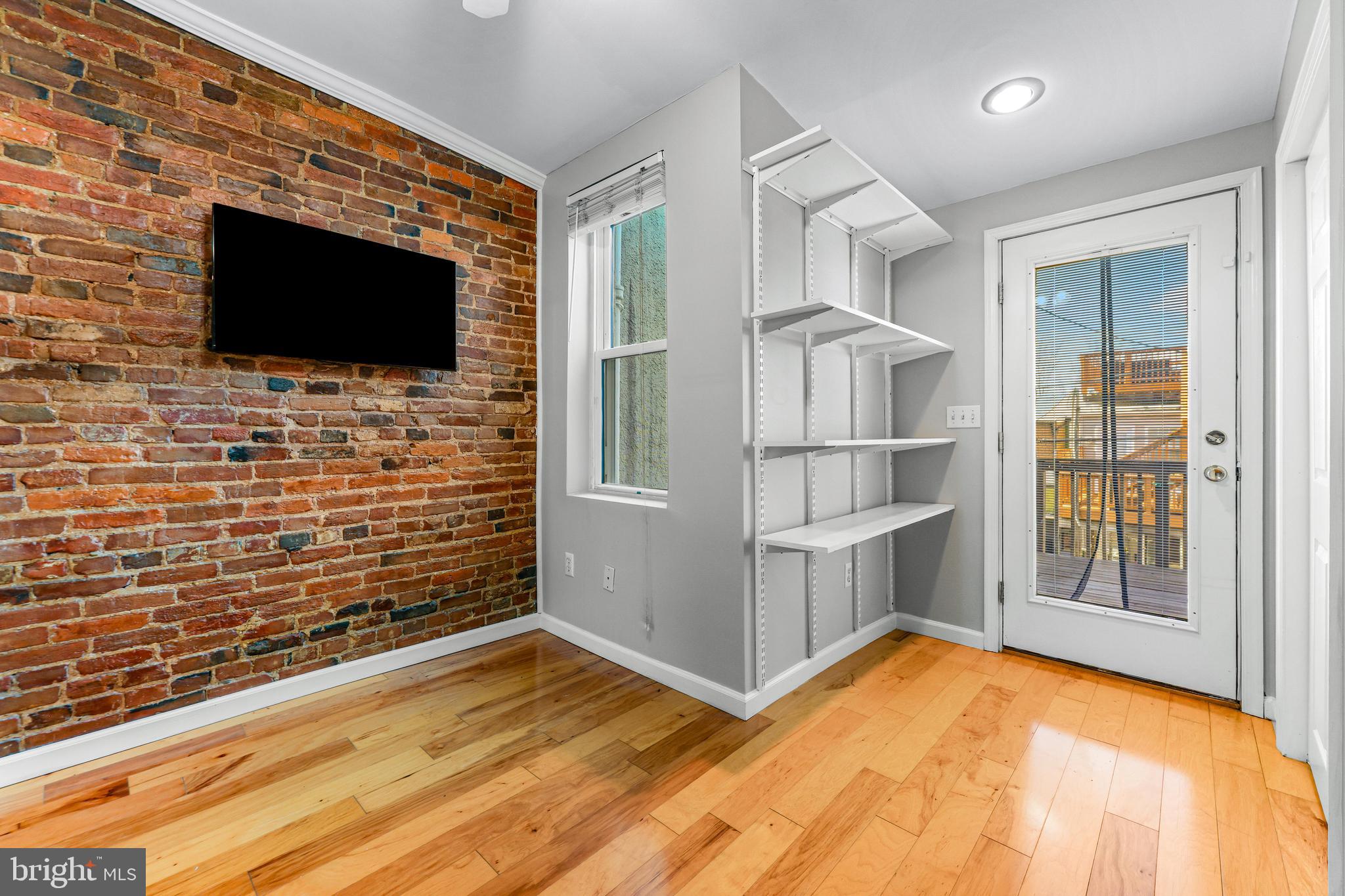 1432 Haubert Street Baltimore, MD 21230 - Photo 23 of 41 Bedroom #2 with access to deck