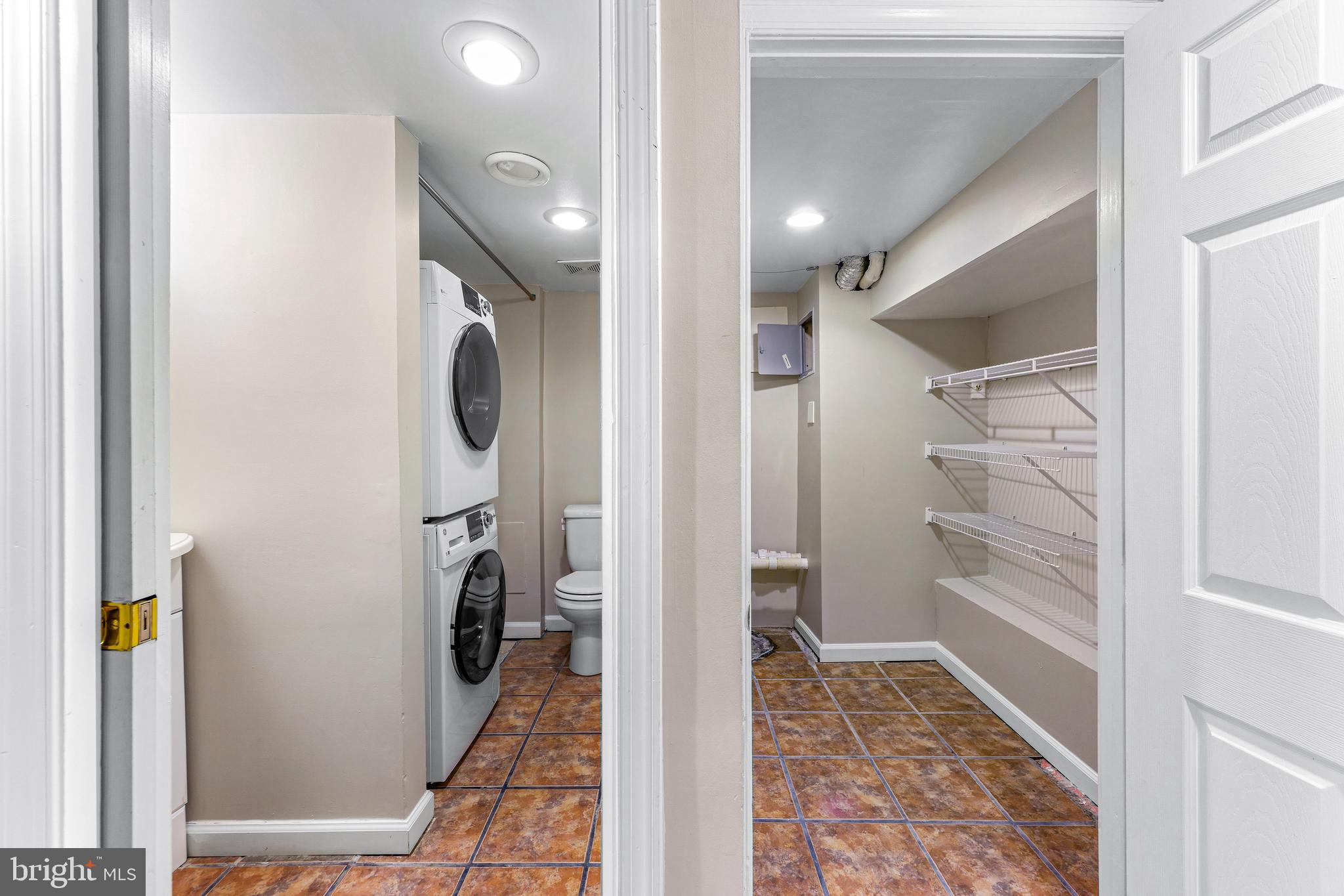 1432 Haubert Street Baltimore, MD 21230 - Photo 25 of 28 a bathroom with a sink and a mirror