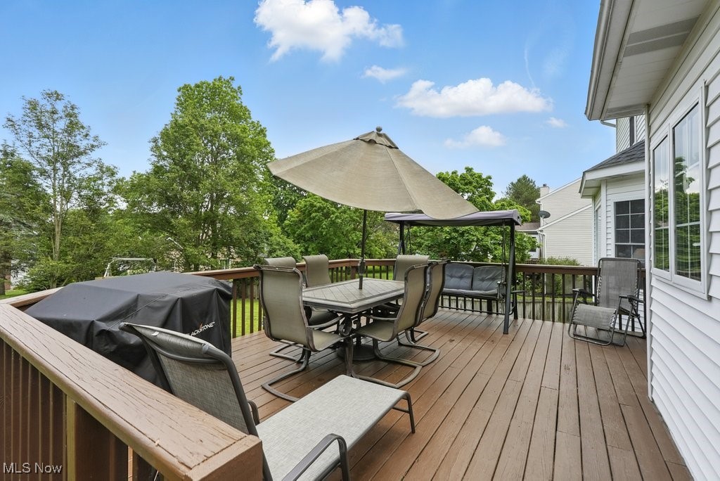 3385 Marsh Road Stow, OH 44224 - Photo 6 of 30 Wooden deck featuring outdoor dining space