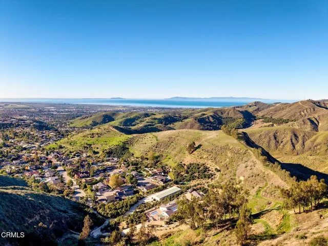 an aerial view of mountain with trees