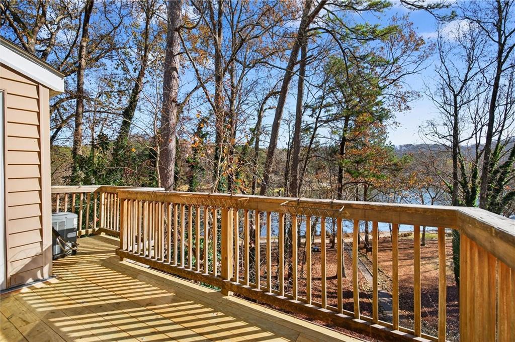 263 Quail Run Roswell, GA 30076 - Photo 20 of 47 a view of balcony with wooden floor and fence