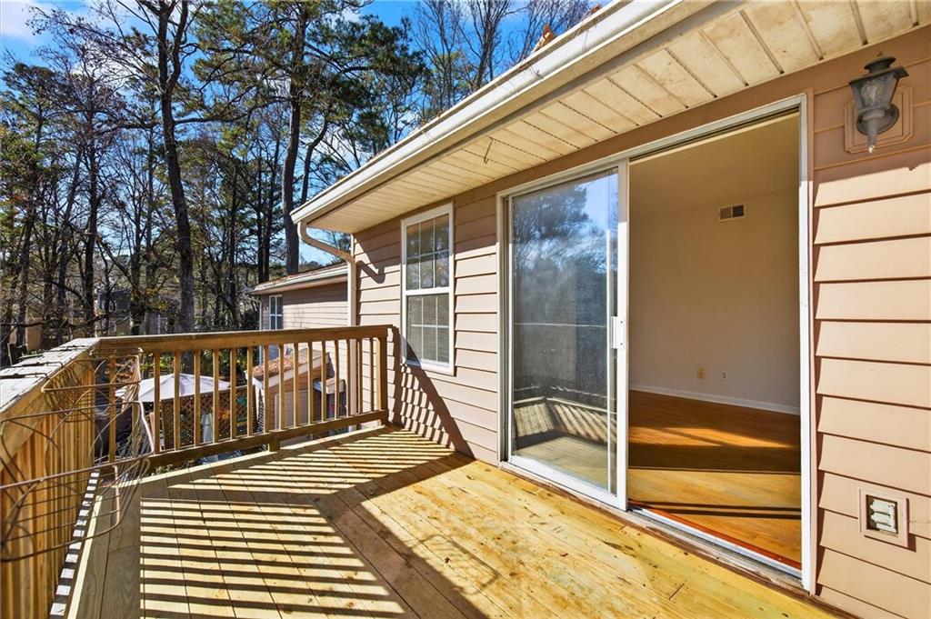 263 Quail Run Roswell, GA 30076 - Photo 21 of 47 a view of balcony with wooden floor and fence