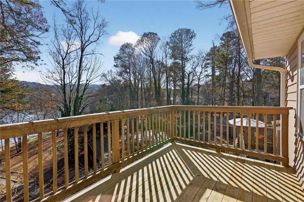 263 Quail Run Roswell, GA 30076 - Photo 22 of 47 a view of balcony with wooden floor