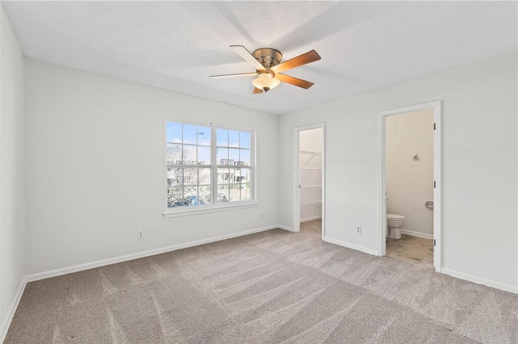 263 Quail Run Roswell, GA 30076 - Photo 26 of 47 a view of an empty room with a window