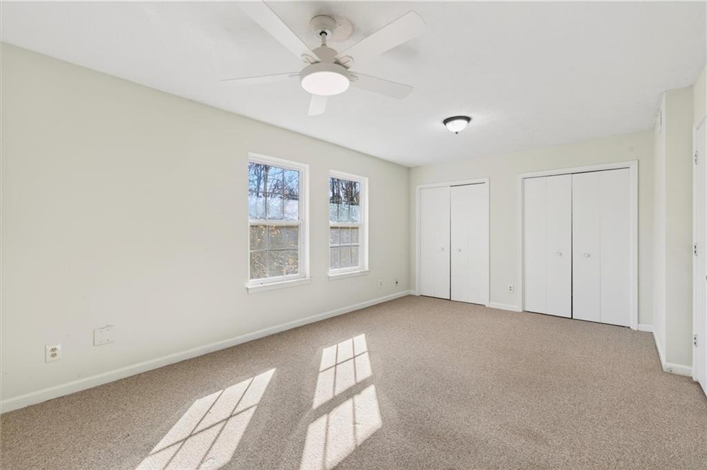 263 Quail Run Roswell, GA 30076 - Photo 29 of 47 a view of an empty room with a window