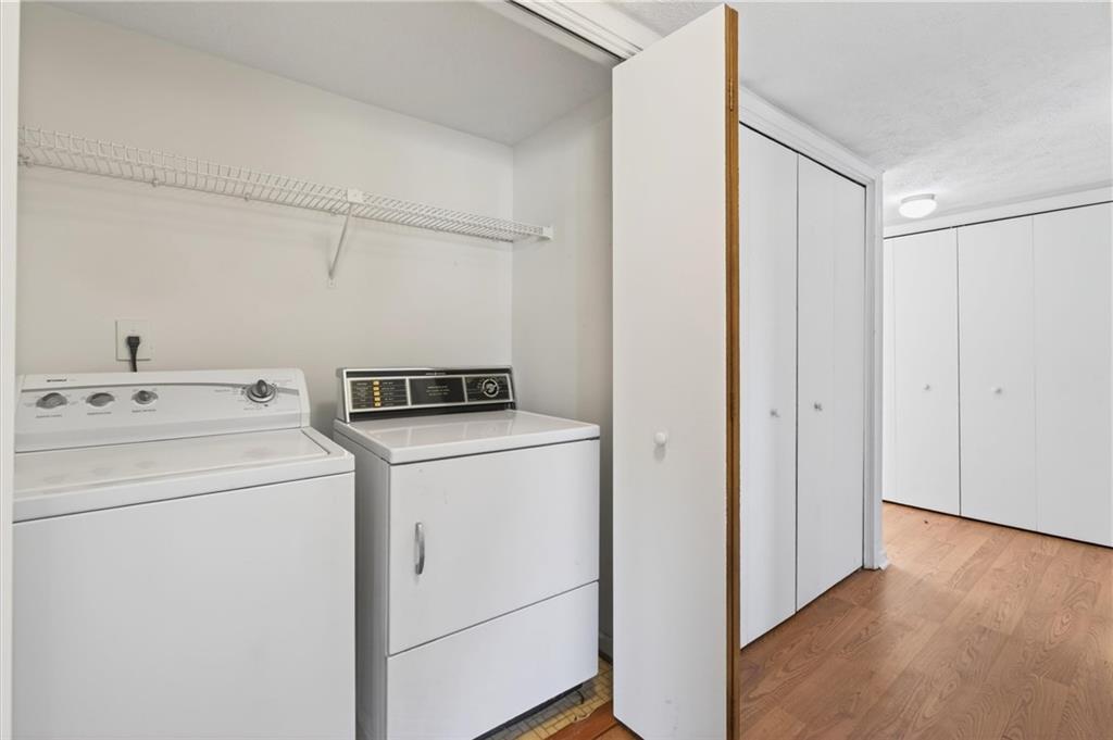 263 Quail Run Roswell, GA 30076 - Photo 32 of 47 a utility room with dryer and washer