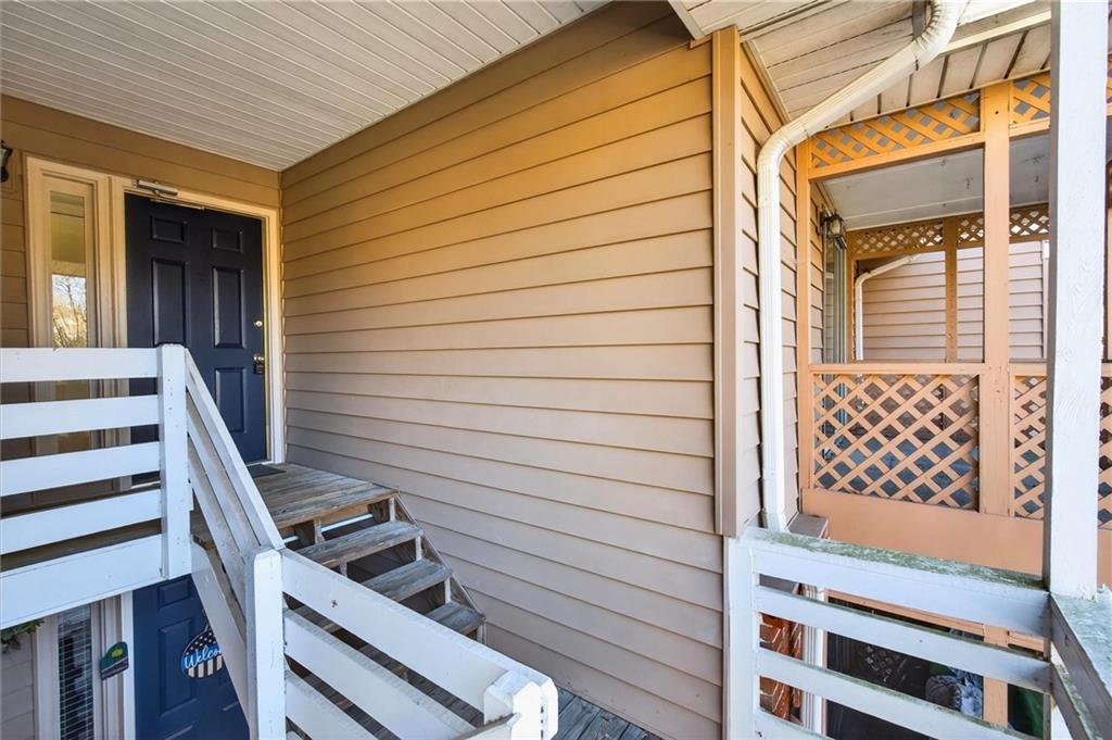 263 Quail Run Roswell, GA 30076 - Photo 33 of 47 a view of a patio with wooden door