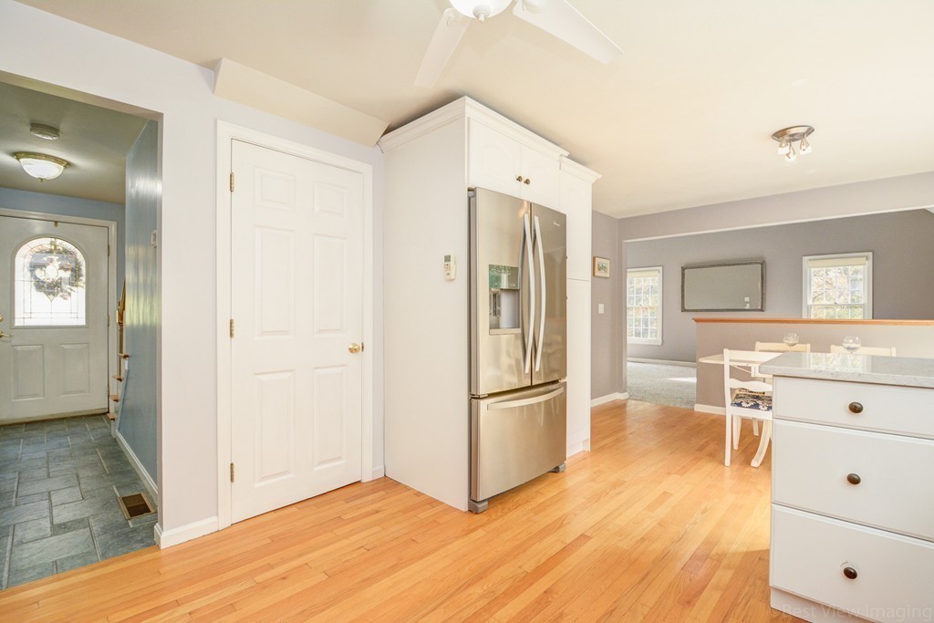 7 Magnolia Drive Ayer, MA 01432 - Photo 4 of 28 a view of a kitchen with wooden floor