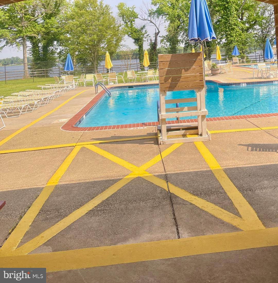 67203 Delaire Landing Road, Unit 203 Philadelphia, PA 19114 - Photo 22 of 29 a view of outdoor space with swimming pool