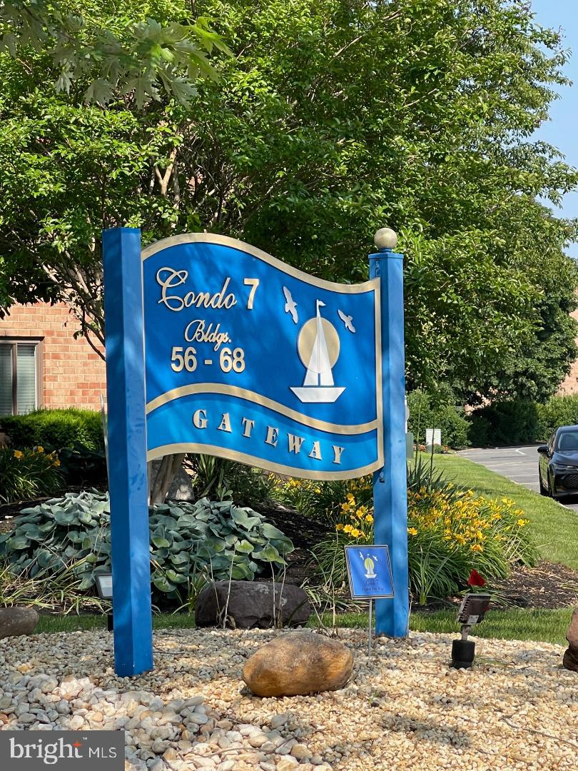 67203 Delaire Landing Road, Unit 203 Philadelphia, PA 19114 - Photo 25 of 29 a sign broad on the side of the road