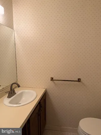a bathroom with a sink and a toilet