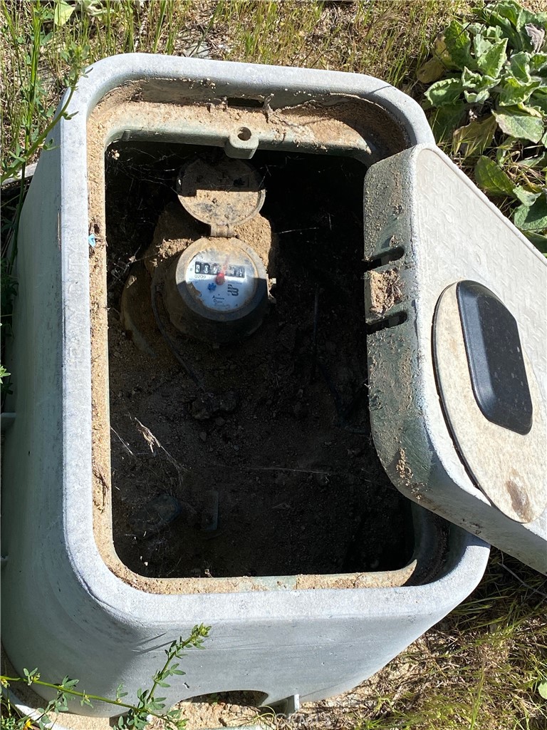 3 Las Palmeras Drive Temecula, CA 92590 - Photo 4 of 8 a close view of sink and mirror