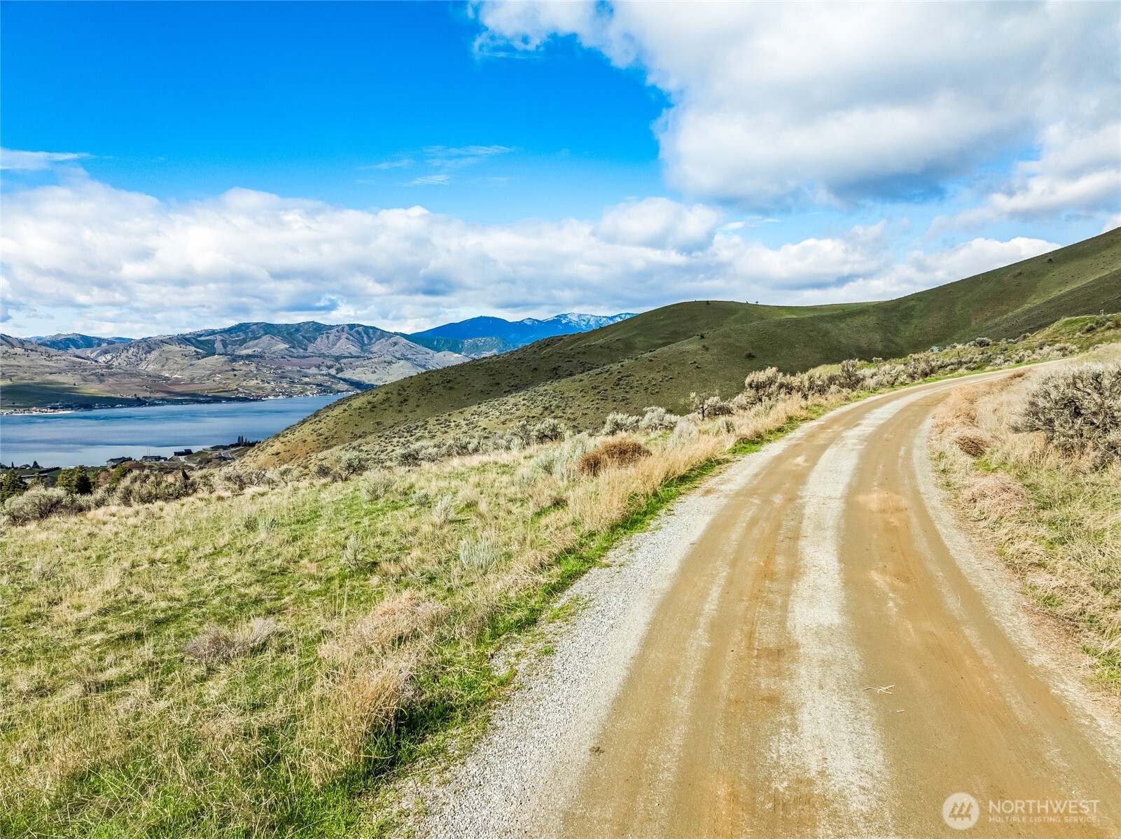 0 Skyfall Lane, Unit D Chelan, WA 98816 - Photo 17 of 31 a view of an outdoor space and a lake view