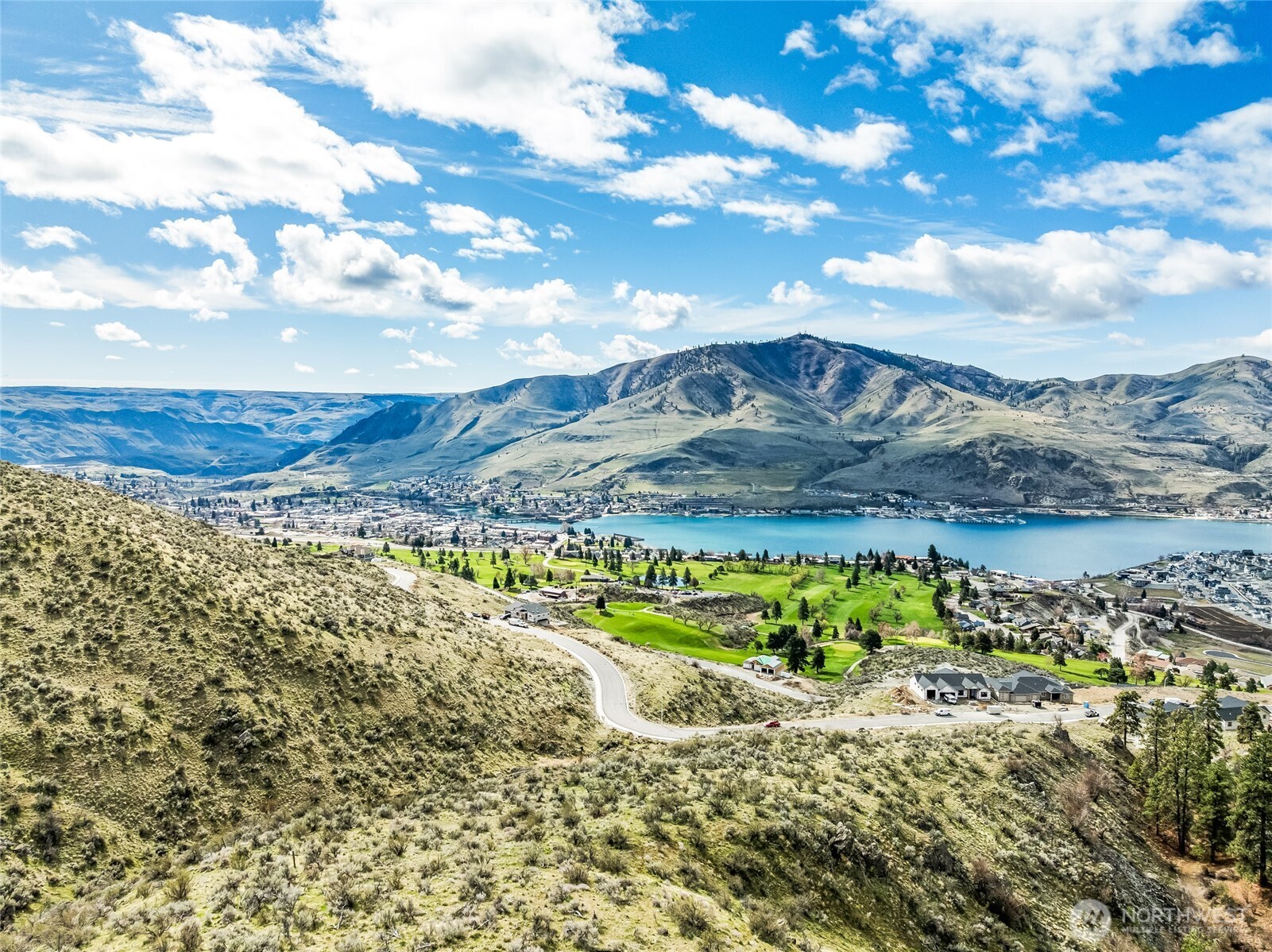 0 Skyfall Lane, Unit D Chelan, WA 98816 - Photo 24 of 31 a view of a houses with a yard