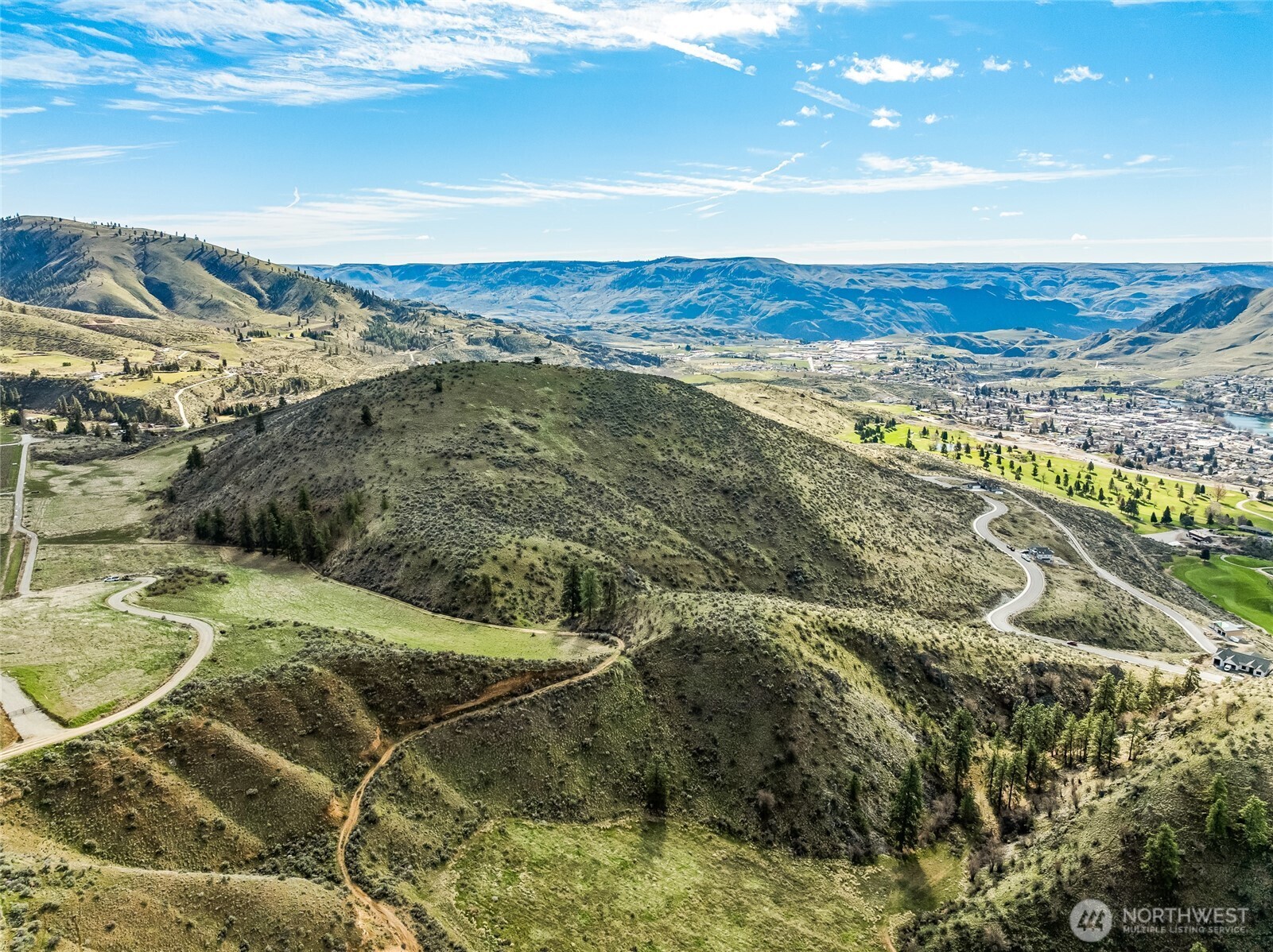 0 Skyfall Lane, Unit D Chelan, WA 98816 - Photo 3 of 31 a view of an ocean and a mountain