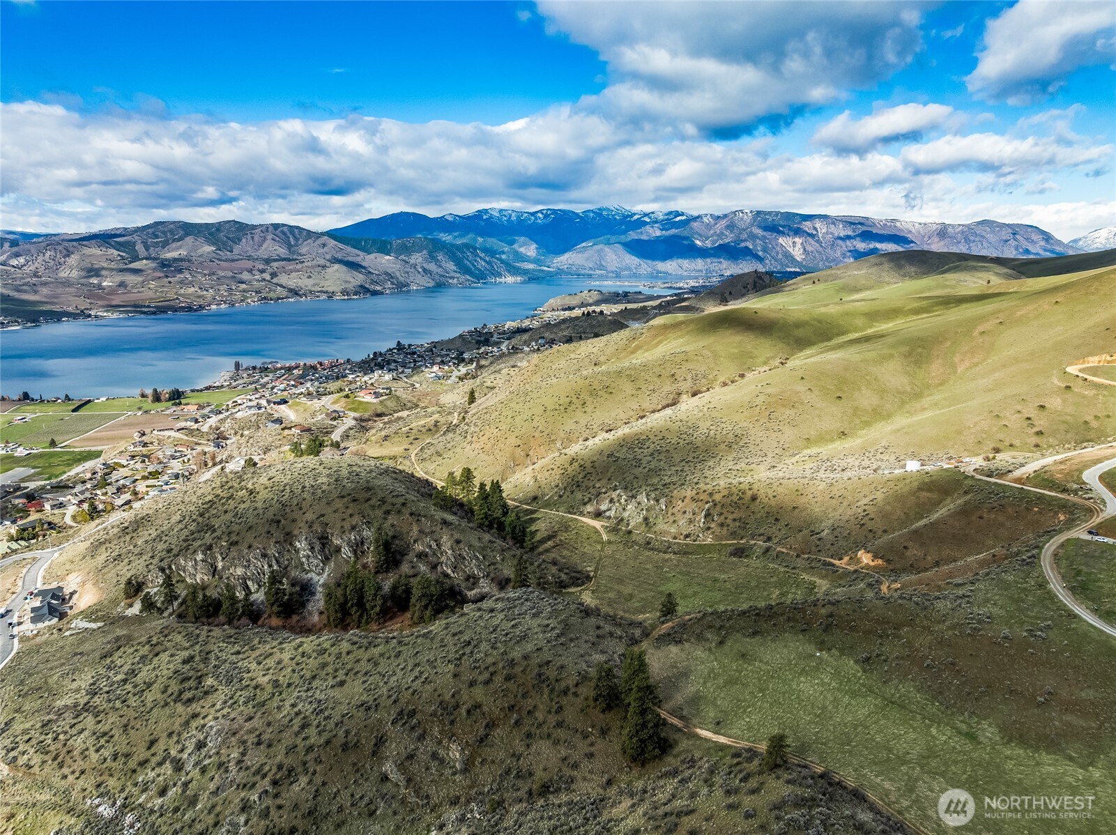 0 Skyfall Lane, Unit D Chelan, WA 98816 - Photo 9 of 31 a view of an ocean and a mountain