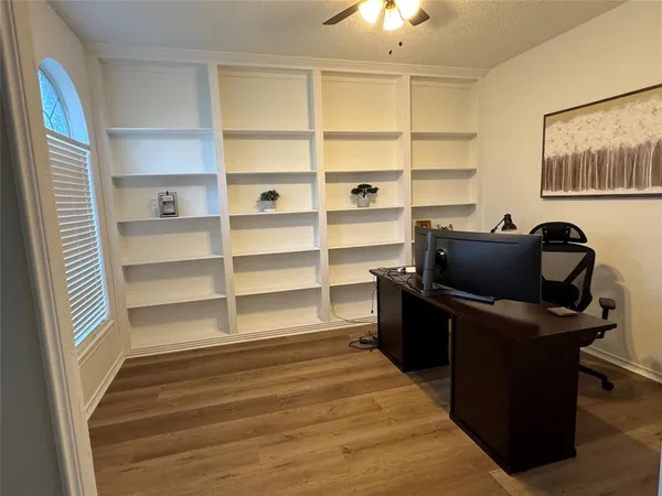 a room with furniture and a window