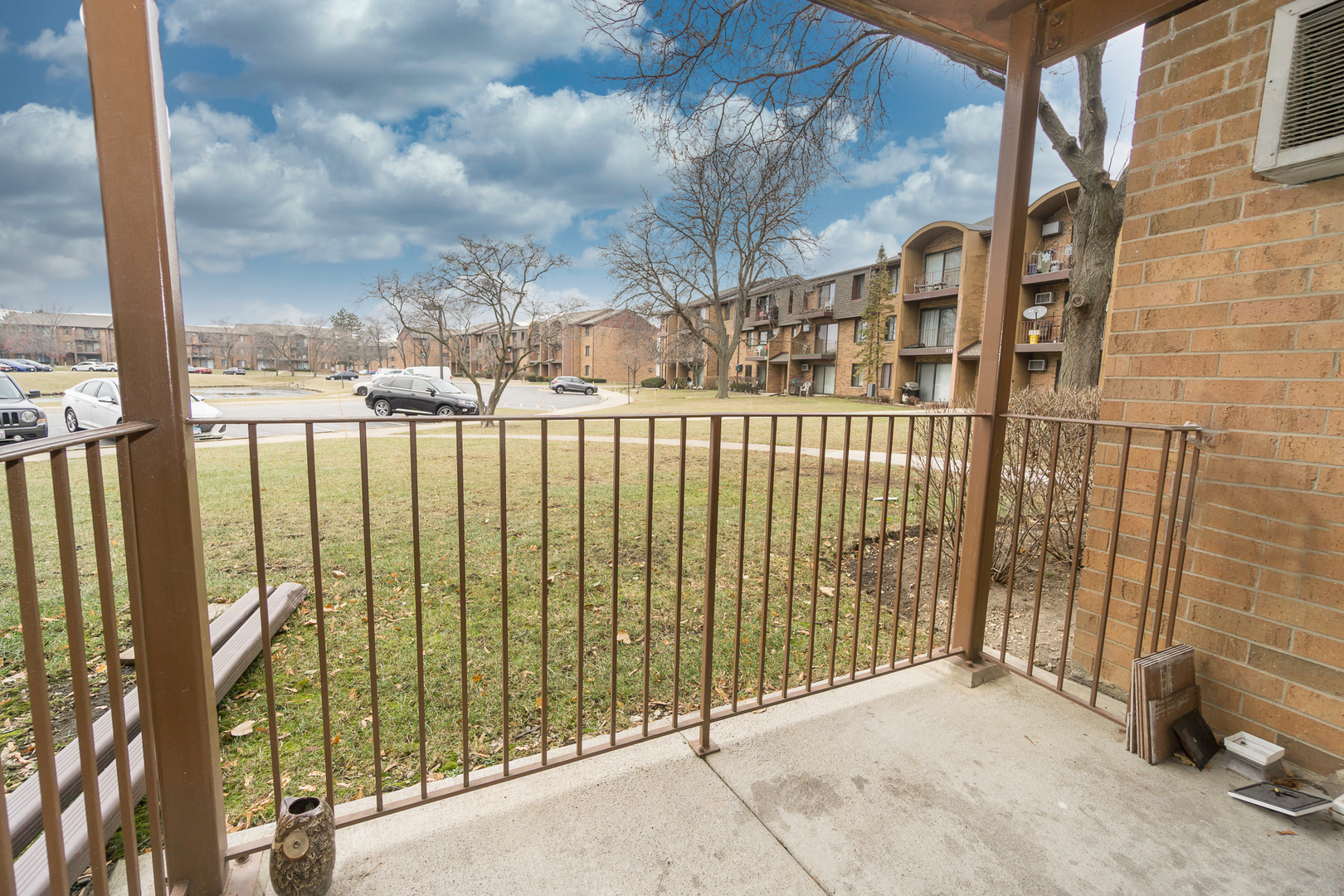 641 Briar Hill Lane, Unit 2 Addison, IL 60101 - Photo 14 of 16 a view of a building with a balcony
