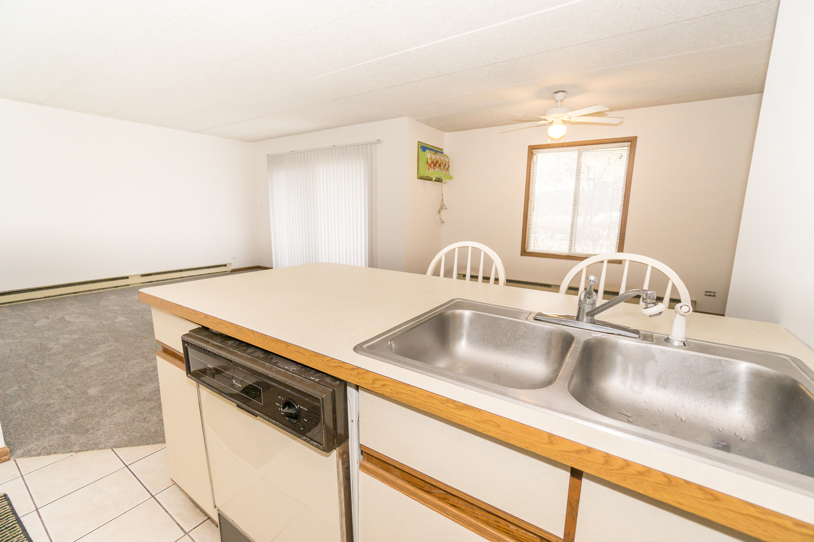 641 Briar Hill Lane, Unit 2 Addison, IL 60101 - Photo 5 of 16 a kitchen with a sink and a window