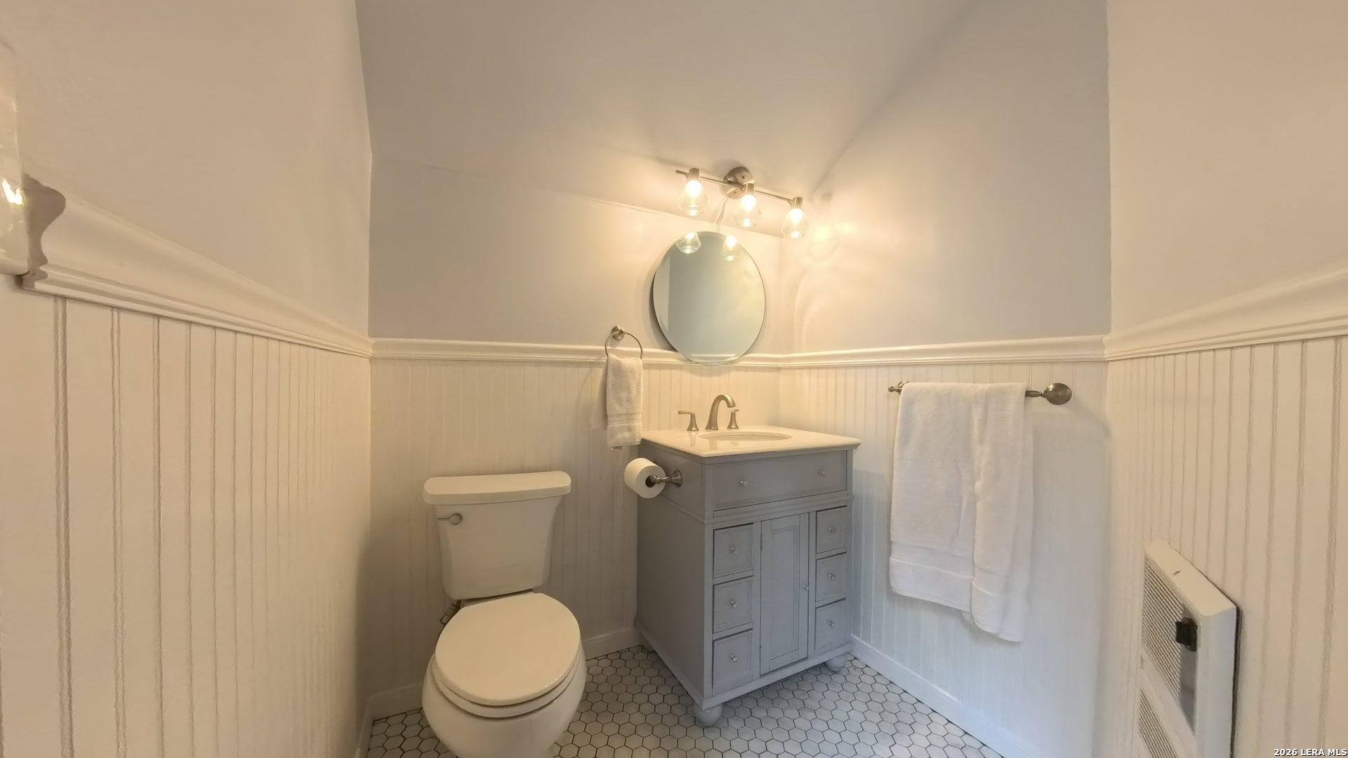 929 Red Bluff Ranch Drive Pipe Creek, TX 78063 - Photo 20 of 43 a bathroom with a toilet a sink and shower