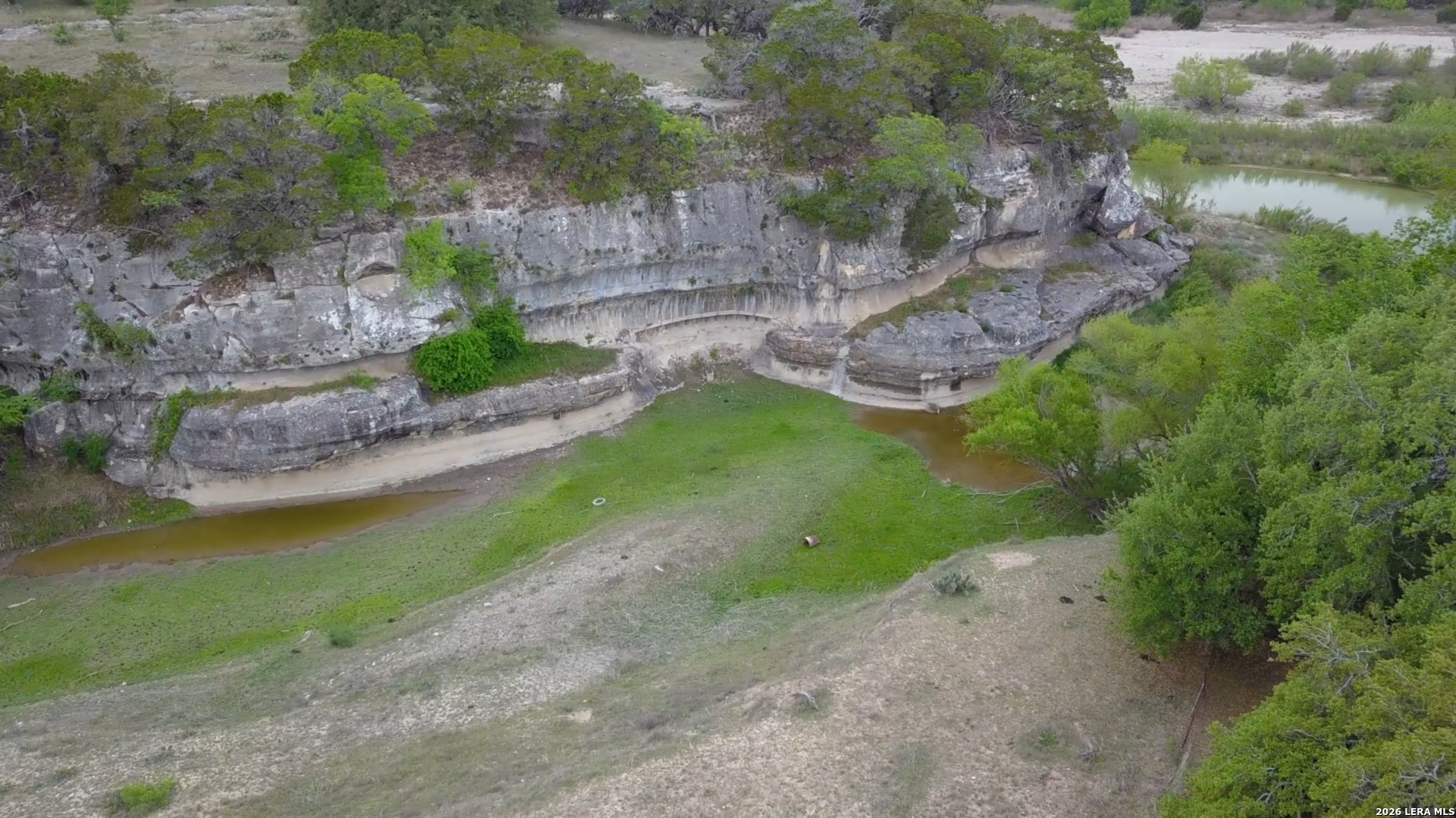 929 Red Bluff Ranch Drive Pipe Creek, TX 78063 - Photo 34 of 44 a view of a street with a yard