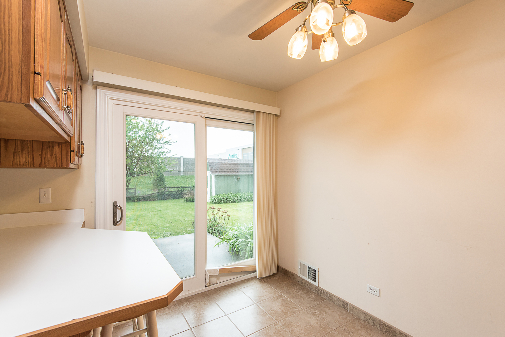 13 Wildwood Road Elk Grove Village, IL 60007 - Photo 14 of 23 a bedroom with a bed and a large window