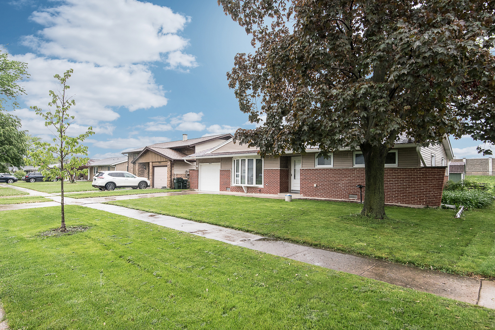 13 Wildwood Road Elk Grove Village, IL 60007 - Photo 2 of 23 a view of a house with a yard