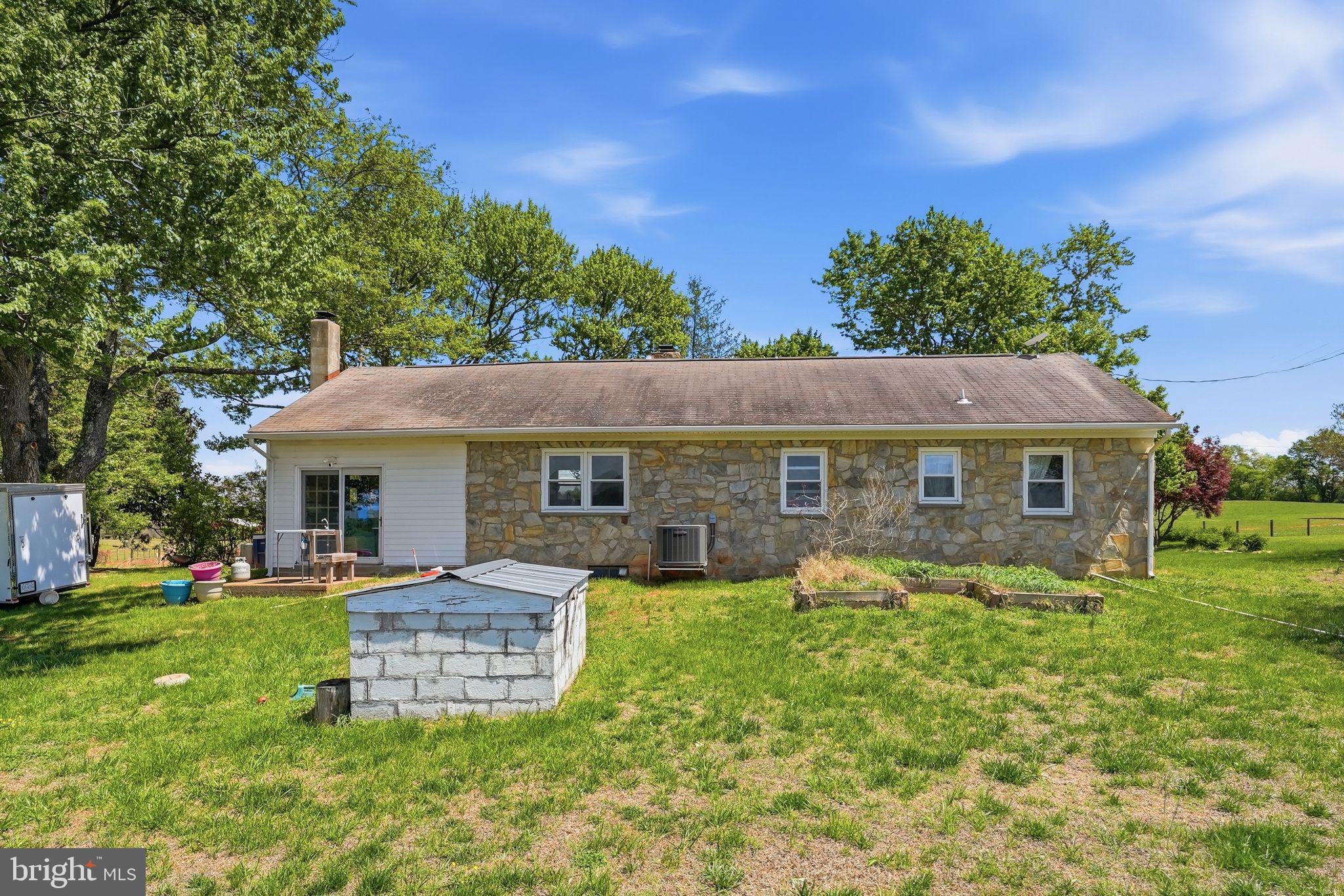 11844 Cemetery Road Remington, VA 22734 - Photo 9 of 13 Charming stone home on lush grounds.