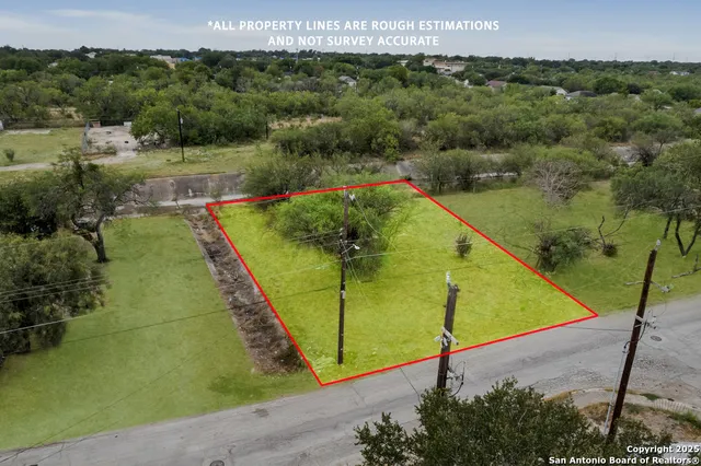 a view of a swimming pool with a yard