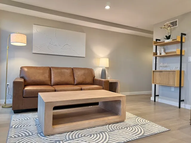 a living room with a couch and a coffee table