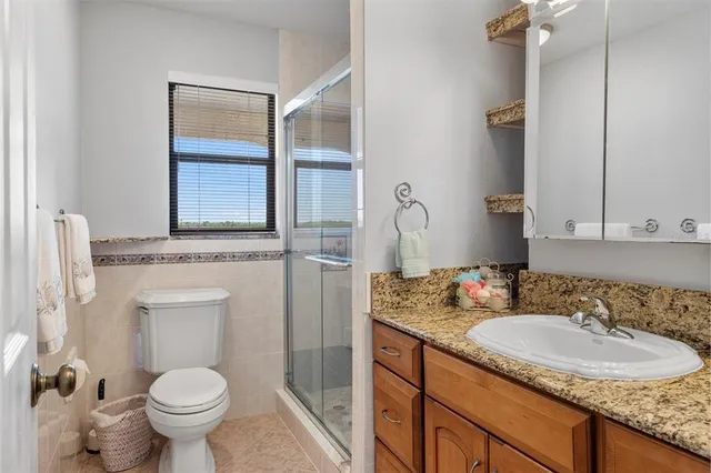 a balcony with view of outdoor space