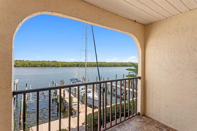 an aerial view of a house with outdoor space