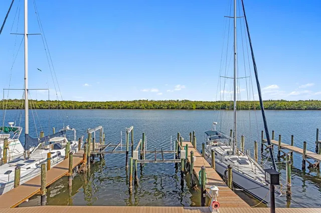 a view of a balcony with chairs