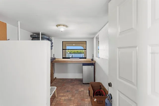 a view of a balcony with chairs