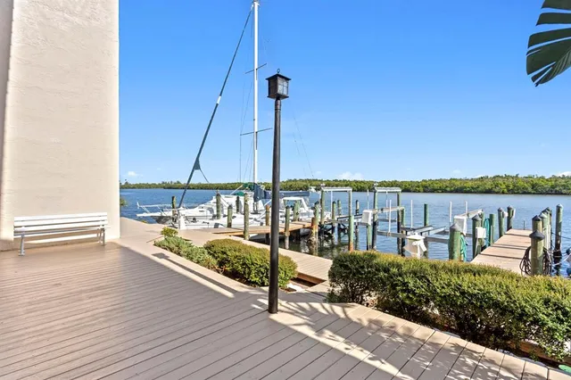 an aerial view of a house with a ocean view