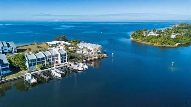 a roof deck view with a lake view