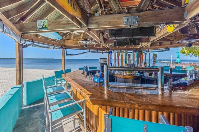 an outdoor space with patio and outdoor seating