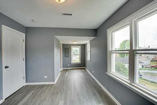 a view of a house with wooden floor